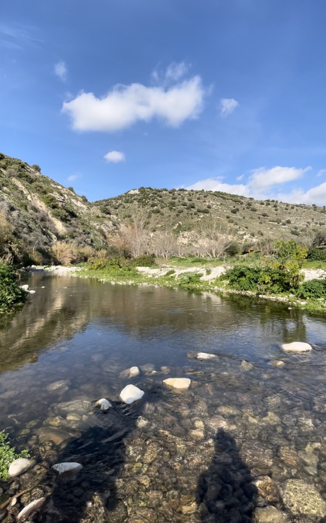 The clear, shallow Irminio river running through the valley